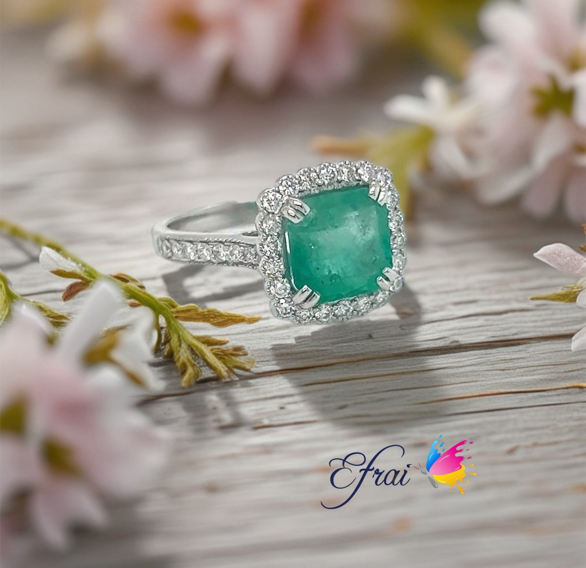 Natural green emerald and diamonds ring