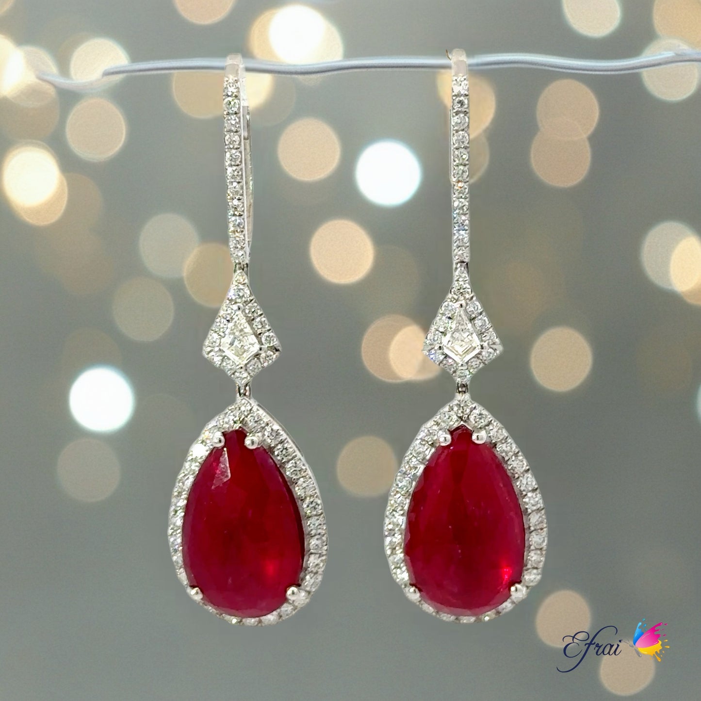 Magnificent Natural Pear shape ruby and diamonds earrings