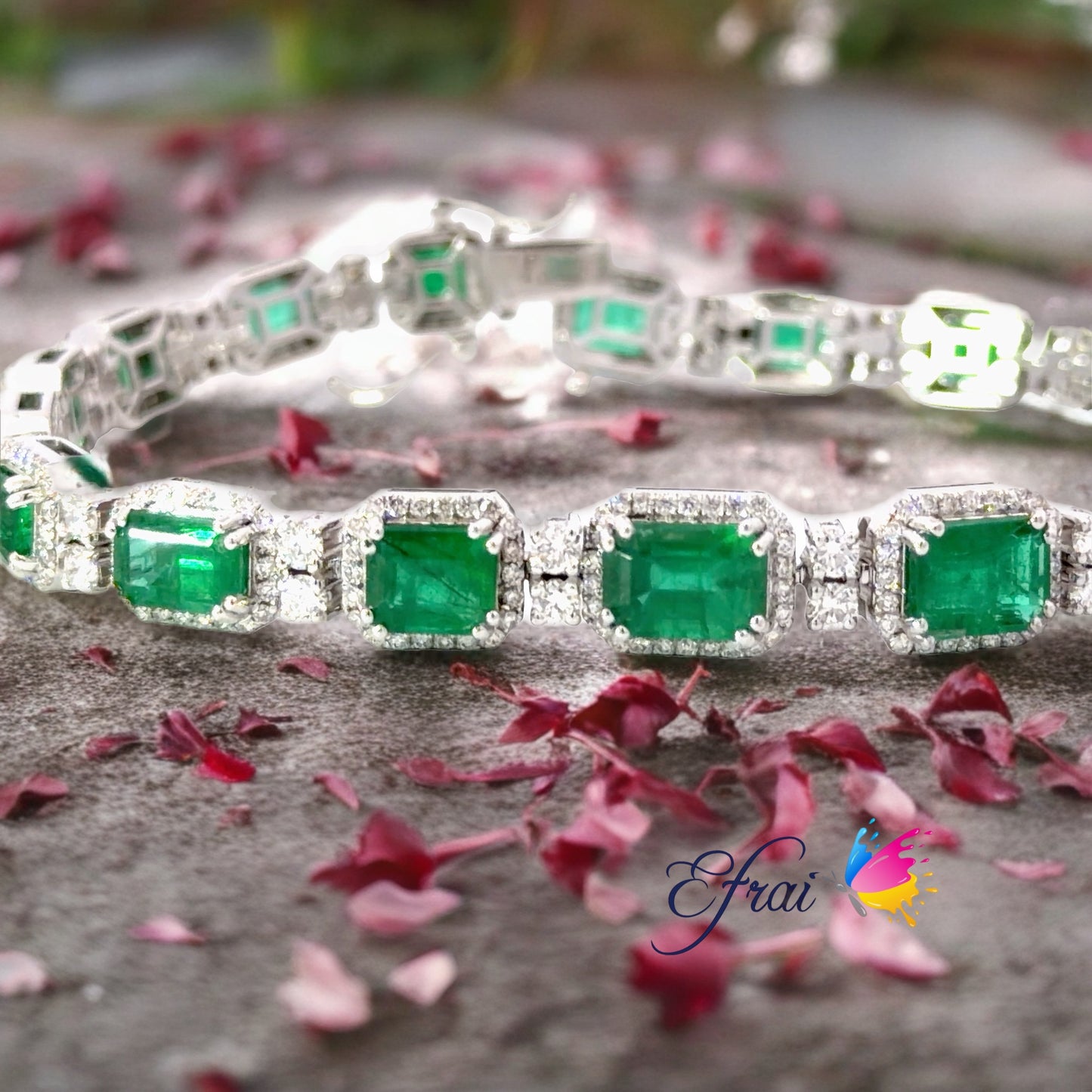 Elegant 18K White Gold Tennis Bracelet with Natural Emerald-Cut Emeralds and diamonds