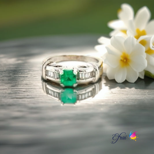 Platinum ring with natural emeralds and diamonds