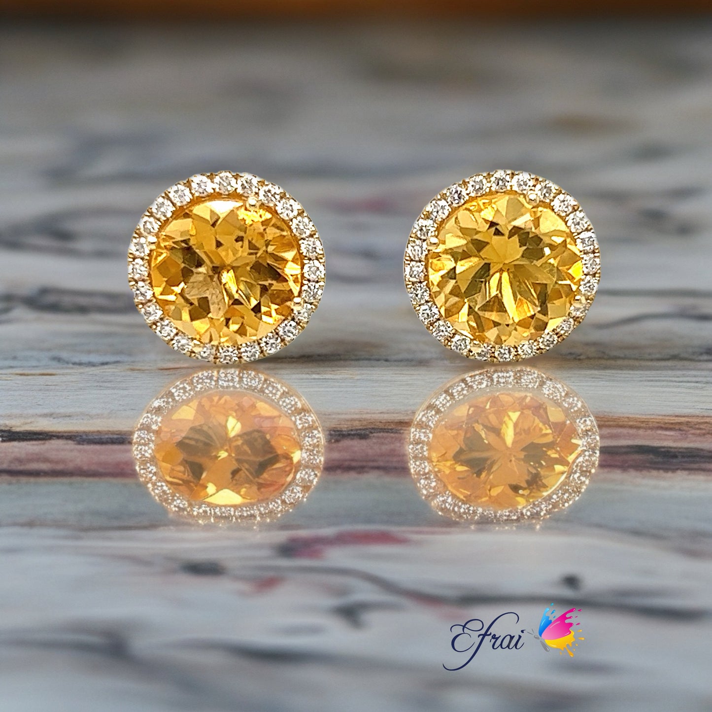 Round yellow spinels diamonds earrings