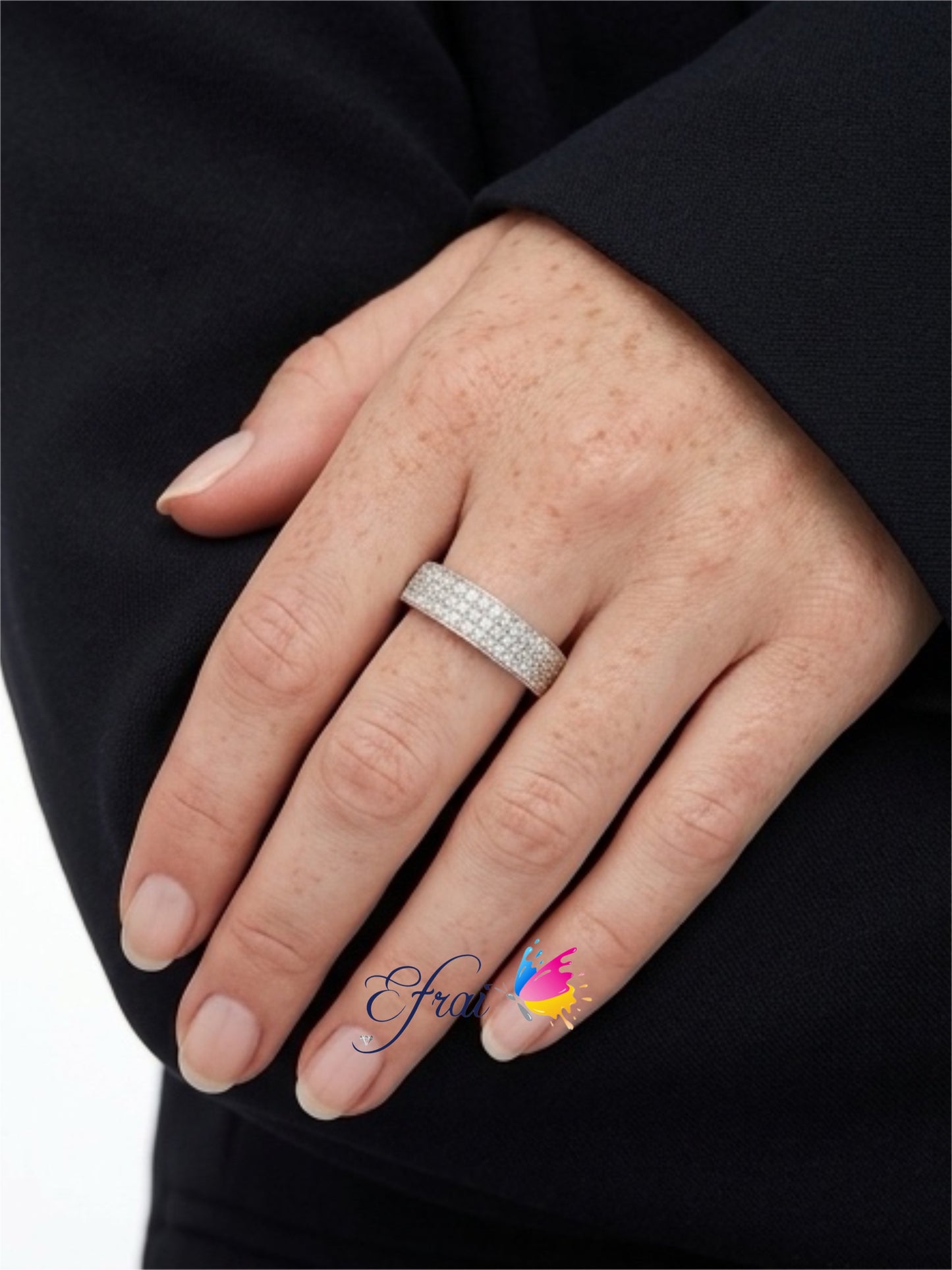 Gorgeous three D design of rows of natural round diamonds band