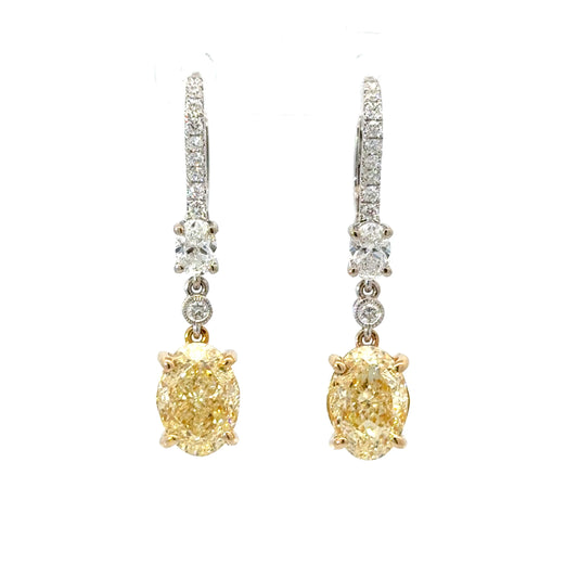 Elegant Natural GIA Certified Oval Yellow Diamond Earrings