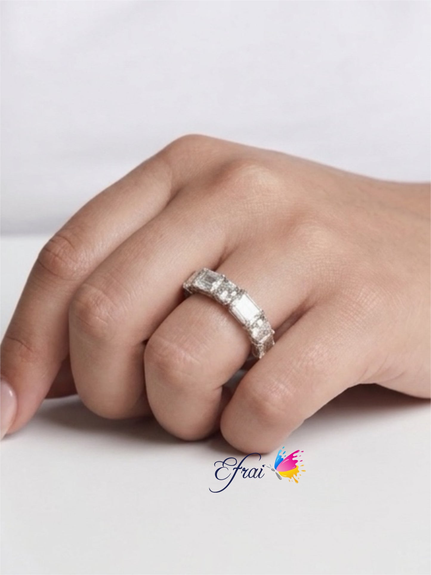 Exquisite natural Emerald cut and round diamonds band