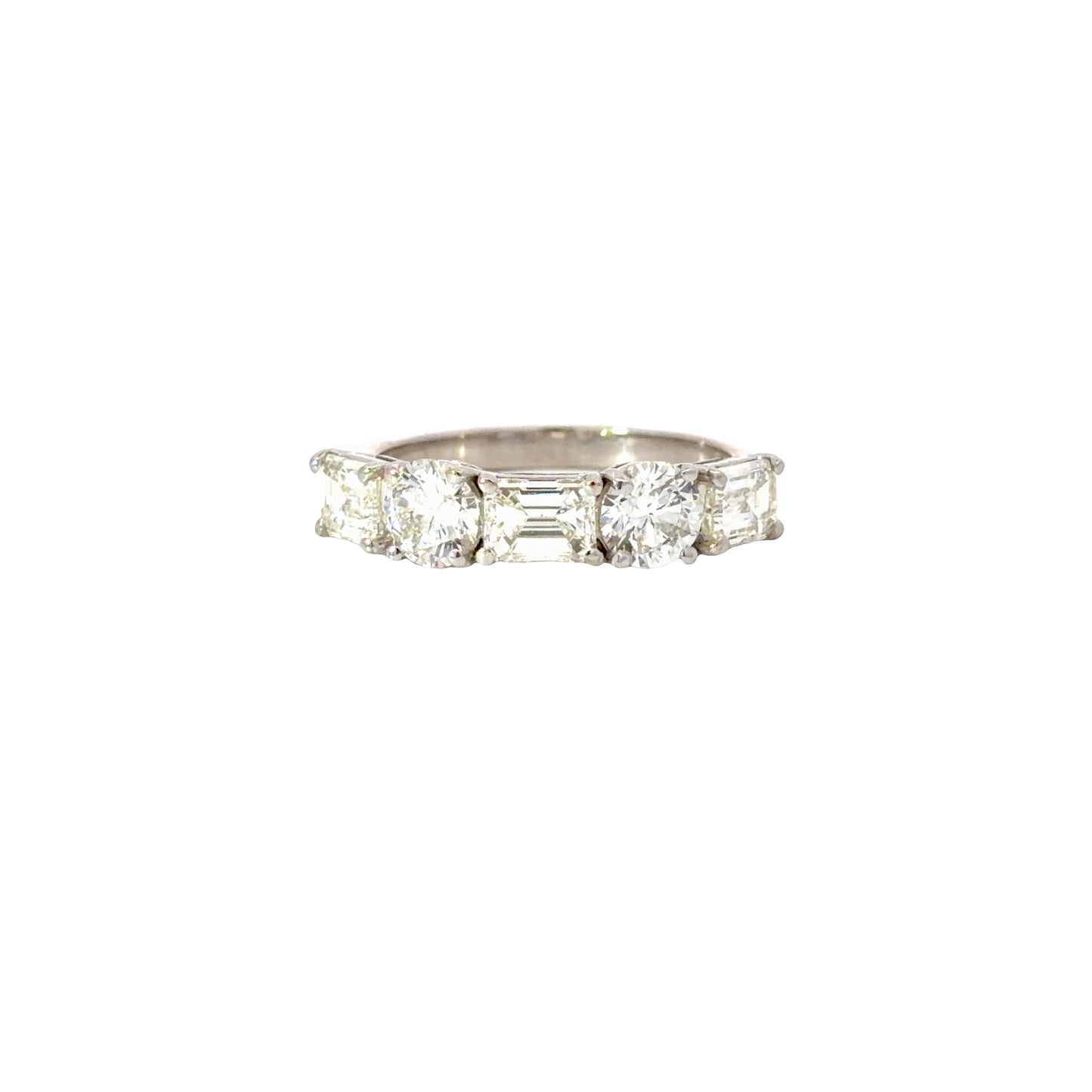 Natural Emerald Cut and round Diamonds Ring