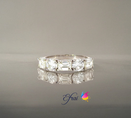Natural Emerald Cut and round Diamonds Ring
