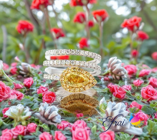 Exquisite 18K White and Yellow Gold Ring with GIA Natural Fancy Intense Yellow Pear Cut Diamond