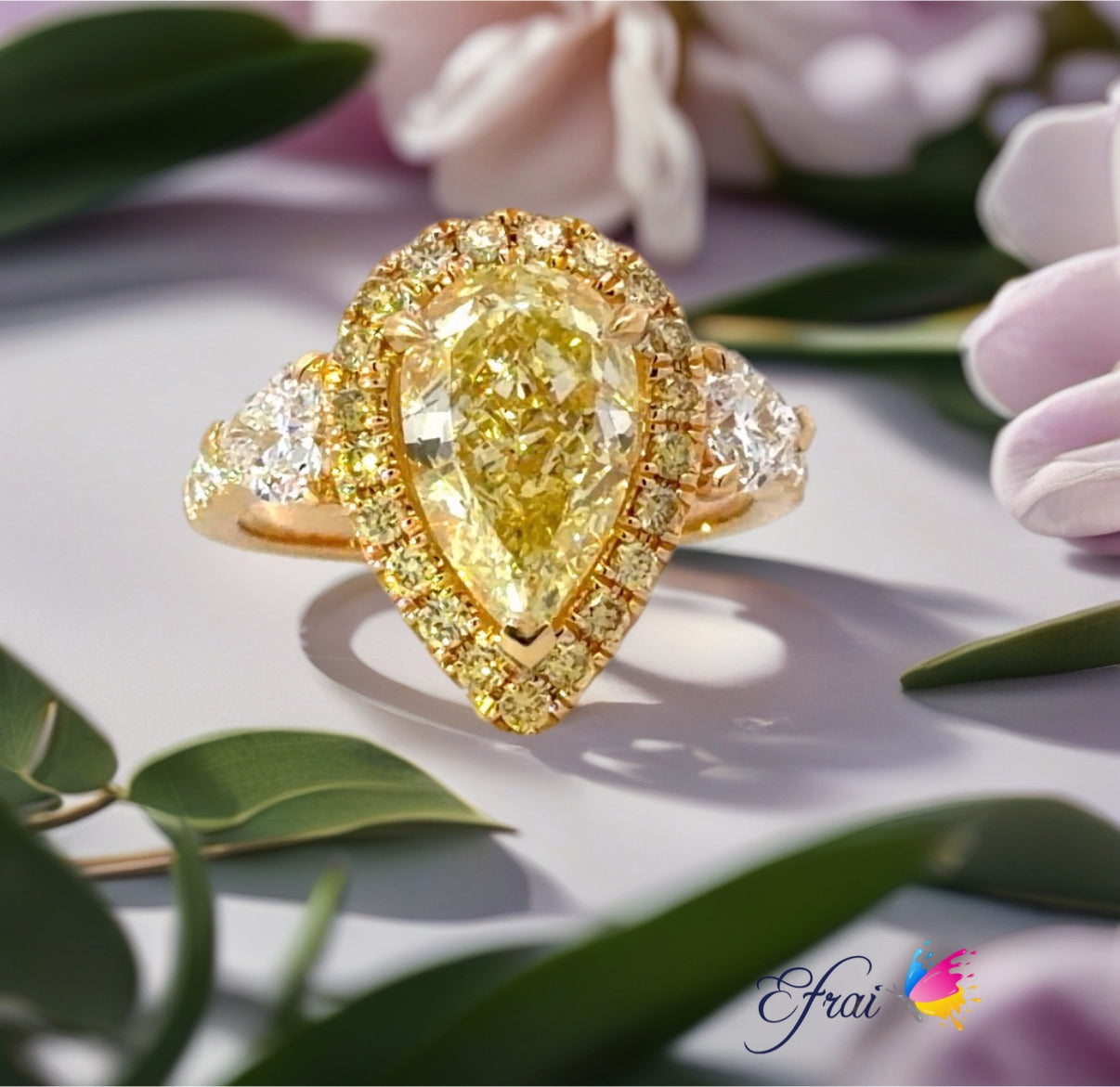 GIA Natural Pear Fancy Yellow Diamond Halo Ring