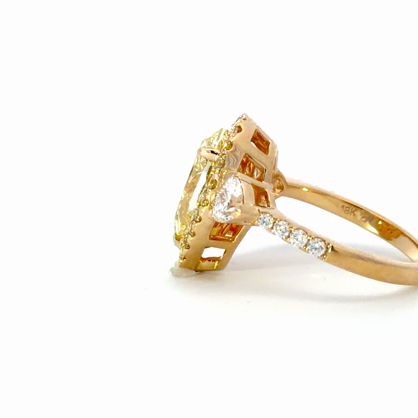 GIA Natural Pear Fancy Yellow Diamond Halo Ring