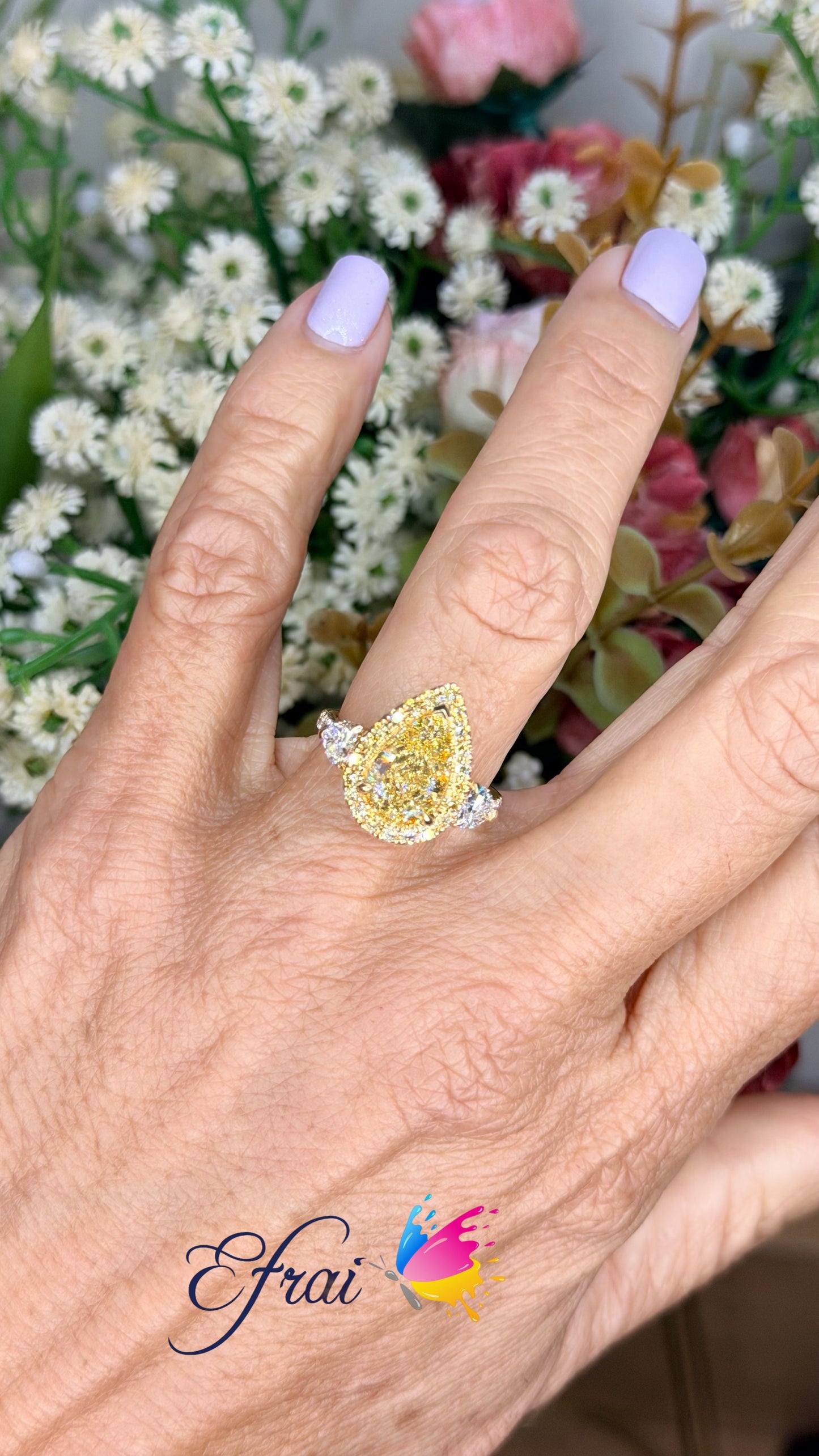 GIA Natural Pear Fancy Yellow Diamond Halo Ring