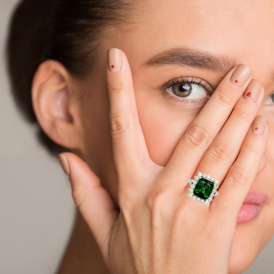 Bright dark green tourmaline and diamonds ring