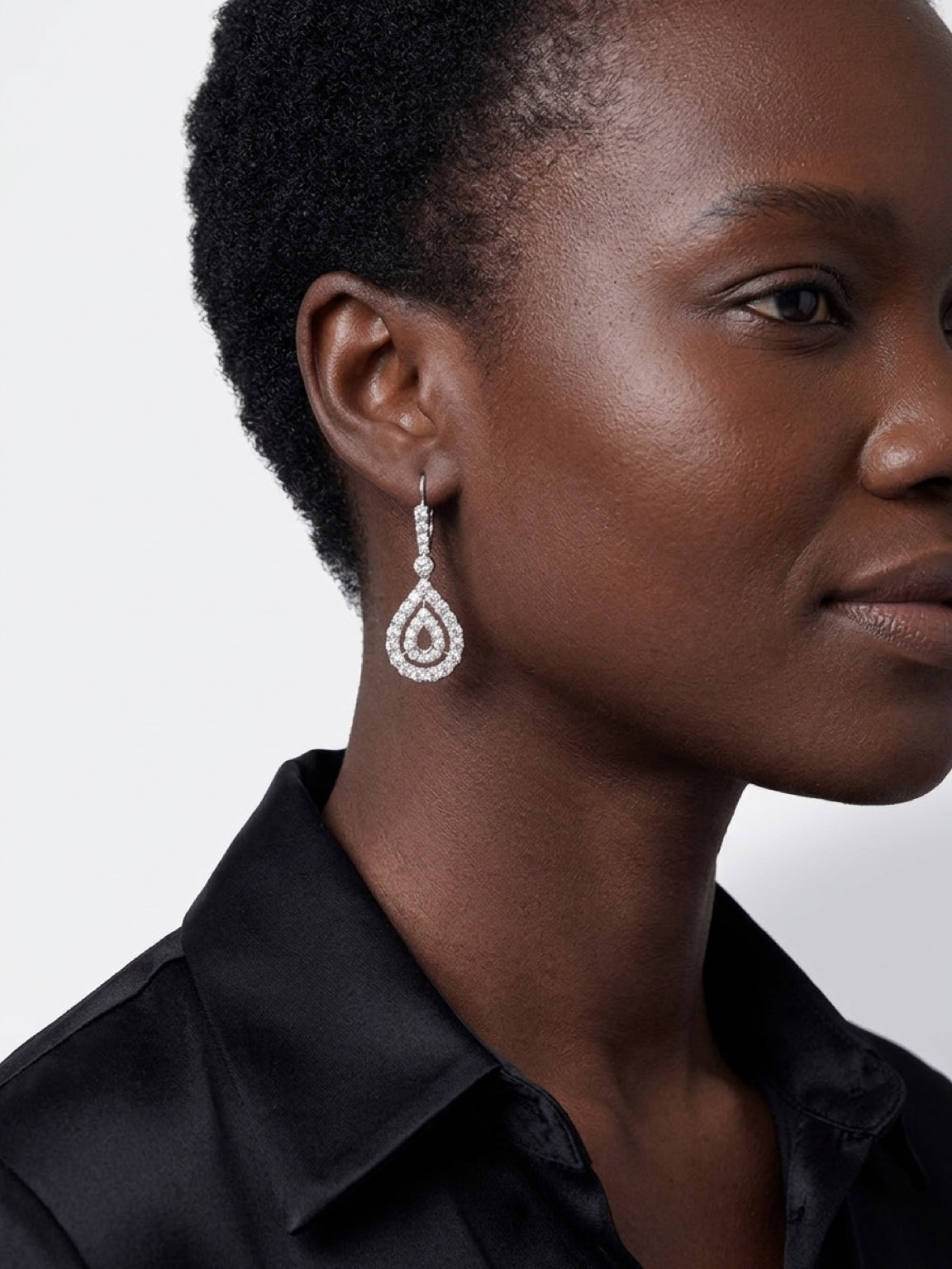 Gorgeous double pear shaped outlined diamonds earrings