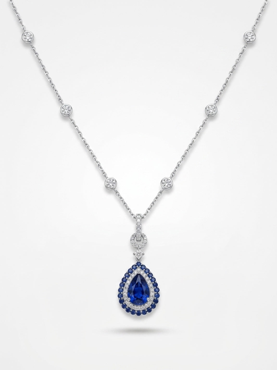 Natural Royal Blue Sapphire Pear Halo Pendant Necklace — White Gold