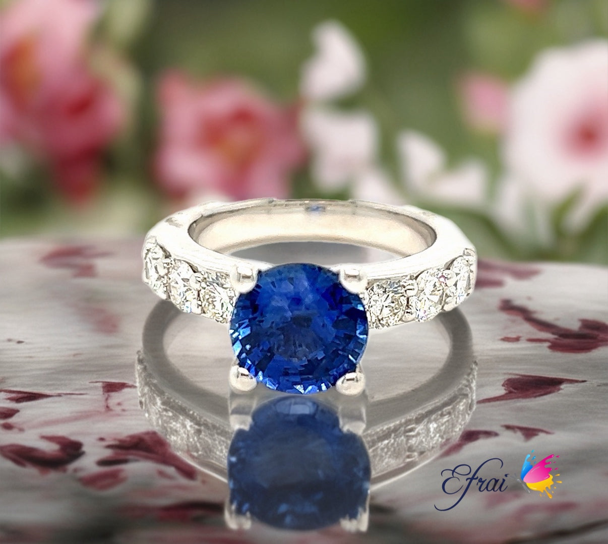 GIA Classy natural round blue sapphires and diamonds ring