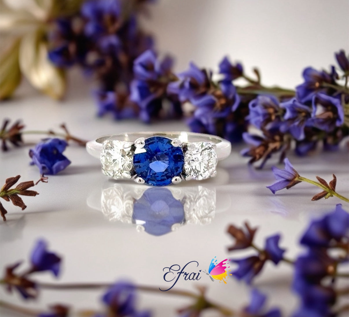 Exotic three stones sapphire and diamonds ring