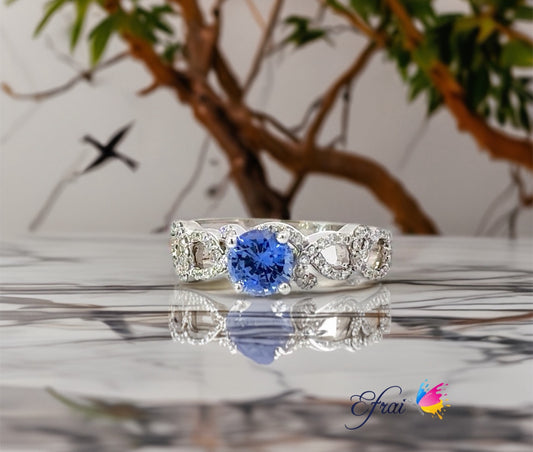 Natural blue round sapphire and diamonds ring